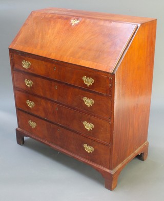 A Georgian inlaid mahogany bureau, the crossbanded inlaid fall front revealing a fitted interior above 4 long graduated drawers with replacement brass swan neck drop handles, raised on bracket feet 42 1/2"h x 38"w x 19"d 