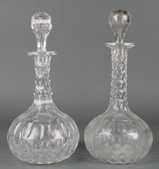 Two Edwardian cut glass mallet shaped decanters and stoppers 