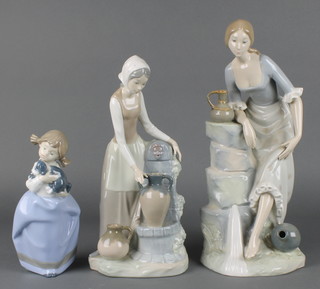 A Nao figure of a young girl with puppy 7", ditto of a water carrier 12" and a larger ditto 13" 