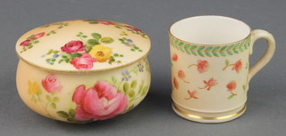 A Royal Worcester blush porcelain box decorated with spring flowers 2 1/2" and a miniature cup decorated with flowers 1 3/4" 