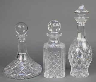 A ships decanter with stopper 10", a Waterford mallet shaped ditto 13" and a Stuart square spirit decanter 10" 