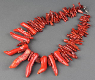 A polished coral necklace 