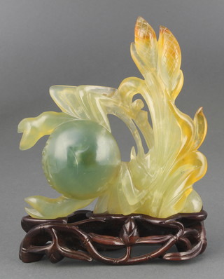 A 20th Century Chinese jade carving of a crab amongst seaweed 4 3/4" on a hardwood stand