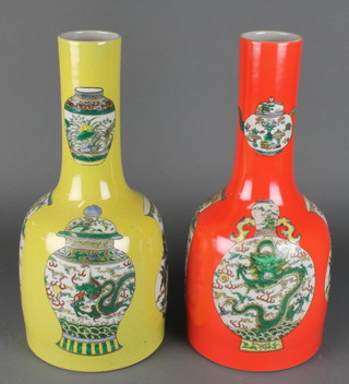 A pair of 18th Century style Chinese bottle vases 1 with a red ground the other with a yellow ground, both decorated with Chinese vases 15" 