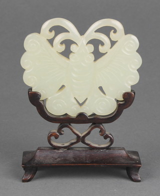 A 20th Century carved jade figure of a butterfly 3" on a hardwood stand