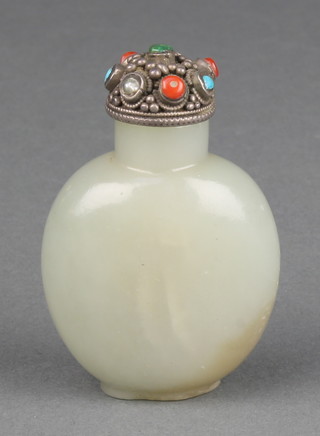 A Chinese 20th Century carved jade scent bottle with plain body and a later silver gem set stopper 
