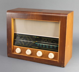 A Bush AC radio receiver type AC34 contained in a walnut case 
