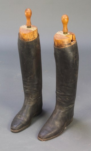 A pair of black leather riding boots, the beech trees marked GWC Harding Esquire Pale & Co London patent no. 5562 
