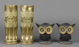 A pair of First World War Continental brass Trench Art shell cases, the bases marked 64 Jan. 1915 9" together with a pair of bronze bookends in the form of owls stamped Baller Austria 4" 