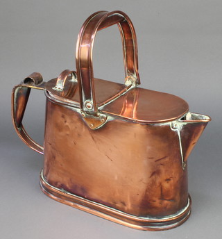 A Victorian boat shaped copper hot water carrier with swing handle 8"h x 16"w x 5 1/2"d (some dents)