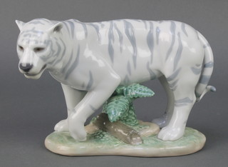 A Lladro figure of a snow tiger 9" 