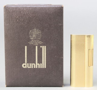 A gentleman's gold plated engine turned Dunhill cigarette lighter A75300 , boxed with papers