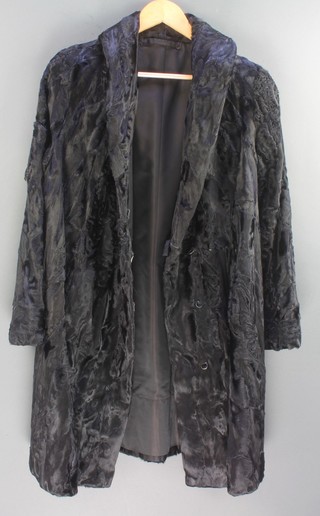 A black "Persian lamb" quarter length jacket
