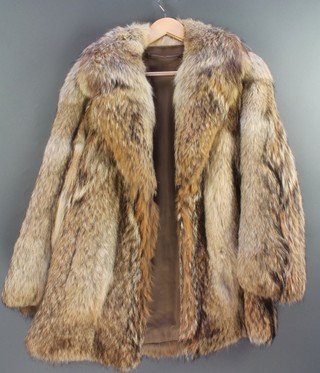 A lady's quarter length fox fur jacket 