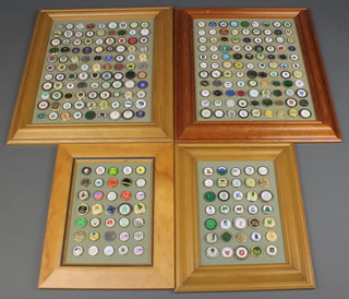 A collection of 268 gilt metal and enamelled golf ball markers contained in 4 pine frames  