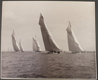 Beken & Sons of Cowes, a silver gelatine hand printed photograph of the yachts Lulworth, Shamrock, HMY Britannia and  White Heather,  negative number 12375, 1926 signed in white ink 9" x 11" 