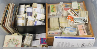 A large collection of loose tea cards and postcards 