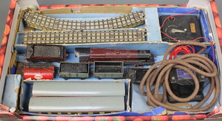 A Hornby Dublo train set with Duchess of Argyle locomotive and tender, 2 carriages, 1 other tender, 3 items of rolling stock, 2 transformers and a small collection of track 