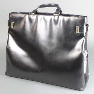 Gucci, a black leather tote/handbag, the interior with fob marked Reg No. 002 2046 0331 14"h x 18 1/2"w x 6 1/2"d 