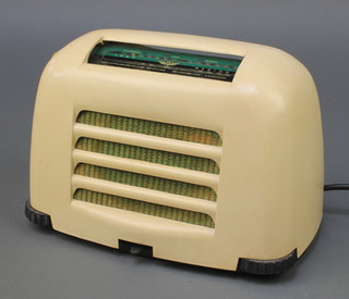 A KB radio contained in a white Bakelite case model no. FB10 serial number 9799 