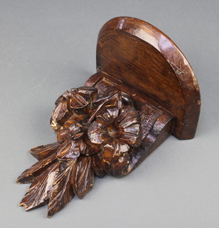 A Victorian floral carved oak bracket 12"h x 6"d x 8"w  