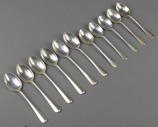 A set of 11 silver rat tail coffee spoons Birmingham 1956, 106 grams 