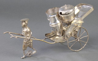 A Malaysian silver condiment in the form of a gentleman pulling a cart, 138 grams, 7"