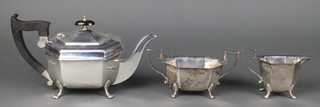 An Art Deco silver 3 piece tea set with ebony mounts on pad feet, Viners Sheffield 1931/38, gross 1007 grams 