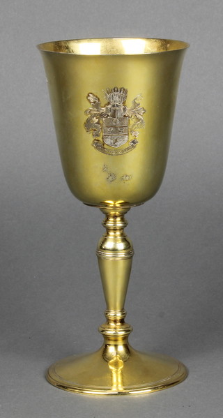A silver gilt presentation cup with well engraved armorial dated London April 20th 1931, the base inscribed reproduction Charles I 1631, the original looted at the Battle of Newbury 1643, 8", 524 grams 