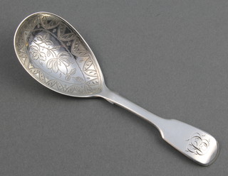 A George III silver caddy spoon with chased bowl and monogram, London 1829, 12 grams