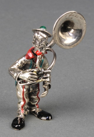 A Continental silver and enamelled figure of a clown playing a French horn, 2 3/4" 58 grams 
