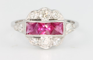An 18ct white gold Art Deco style 3 stone ruby and diamond ring size N 