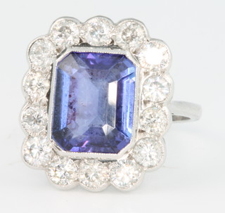 An 18ct white gold tanzanite approx. 4.5ct and diamond surround approx. 1.60ct octagonal shaped dress ring, size O 