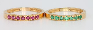 2 (ex 3) 18ct yellow gold half hoop rings, 1 set rubies the other emeralds, size R 