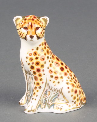 A Royal Crown Derby Imari pattern cheetah cub paperweight with gold stopper 3" 