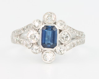 A white gold sapphire and diamond Edwardian style ring, the centre stone approx. 0.5ct surrounded by brilliant cut diamonds approx. 0.7ct size N 
