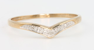 A 9ct  gem set wishbone ring size T 1/2