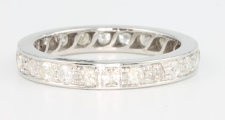 An 18ct white gold diamond set eternity ring, 1.08ct, size P 1/2