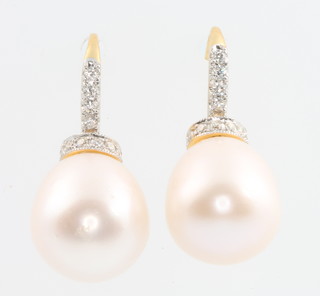 A pair of 18ct yellow gold diamond and cultured pearl earrings, diamonds approx. 0.66ct