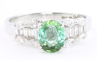 A platinum tourmaline and diamond ring, size S