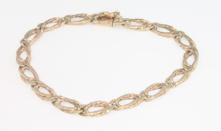 A 9ct yellow gold flat link bright cut bracelet 8.2 grams