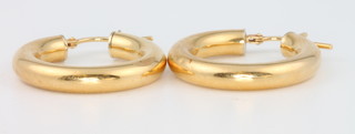 A pair of 18ct yellow gold hoop earrings 2.9 grams
