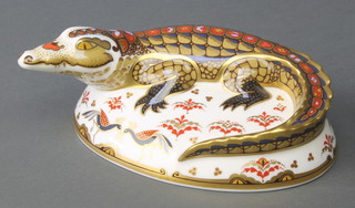 A Royal Crown Derby Imari pattern crocodile paperweight with gold stopper 6" 
