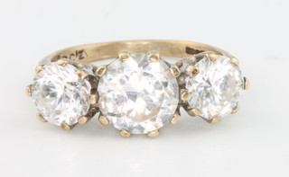 A 9ct yellow gold 3 stone paste ring, size K, 3.4 grams