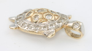 A 14ct 2 colour gold turtle pendant, 2 grams