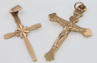 Two 9ct yellow gold cross pendants, 2 grams