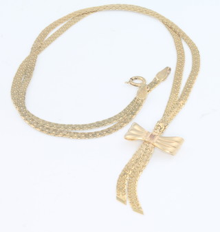 A 9ct yellow gold ribbon and bow necklace 4.2 grams