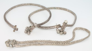 Three foreign silver necklaces, 57 grams