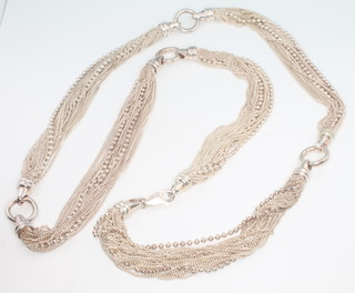 A multi strand silver necklace, 93 grams 