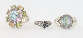 Three silver gem set dress rings, 23 grams 